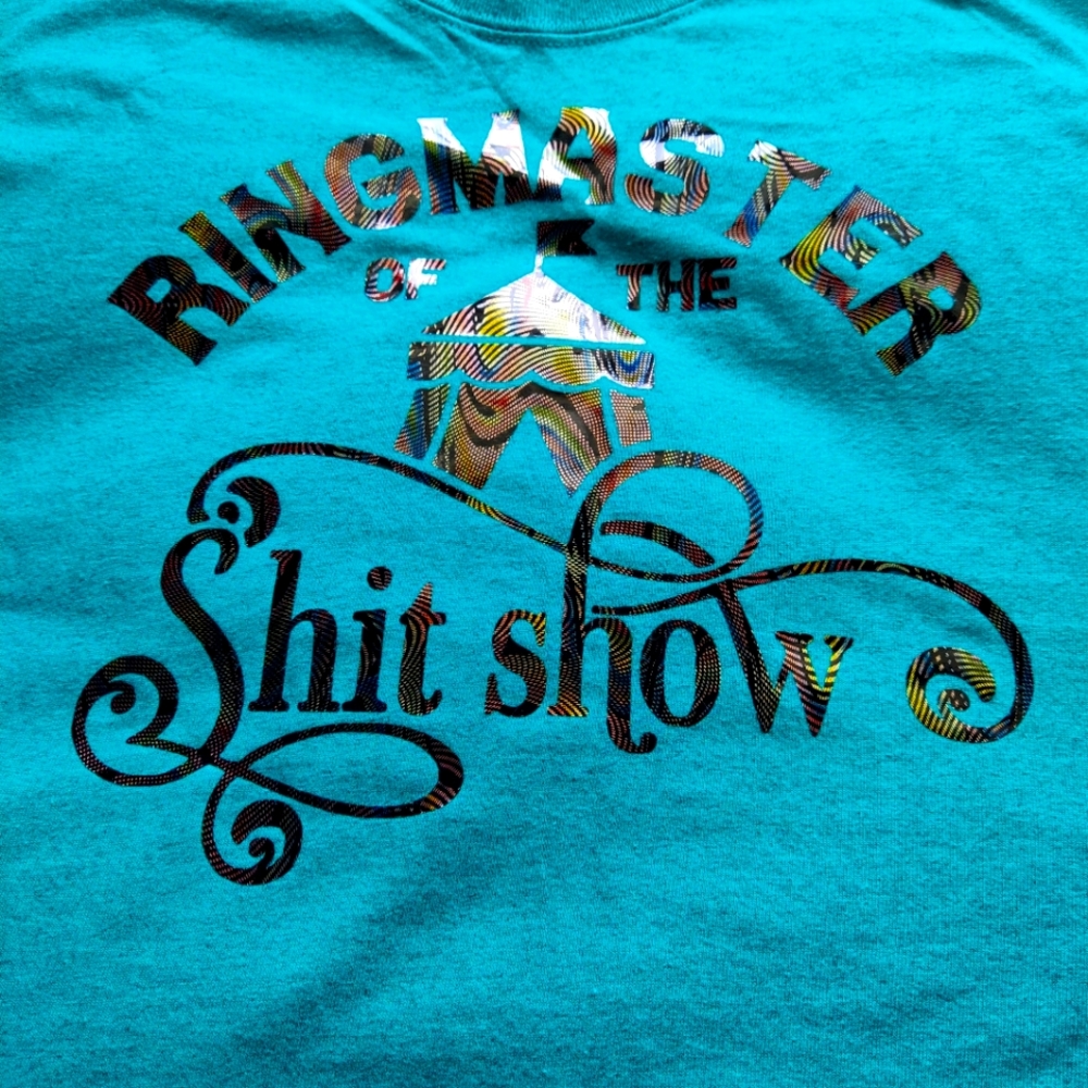Turquoise T Shirt With Rainbow "Ringmaster Of The Shit Show" Decal